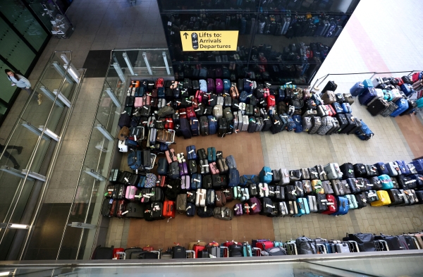 Luggage Piles Join Long Airport Queues in Fresh Woes for Summer Travel